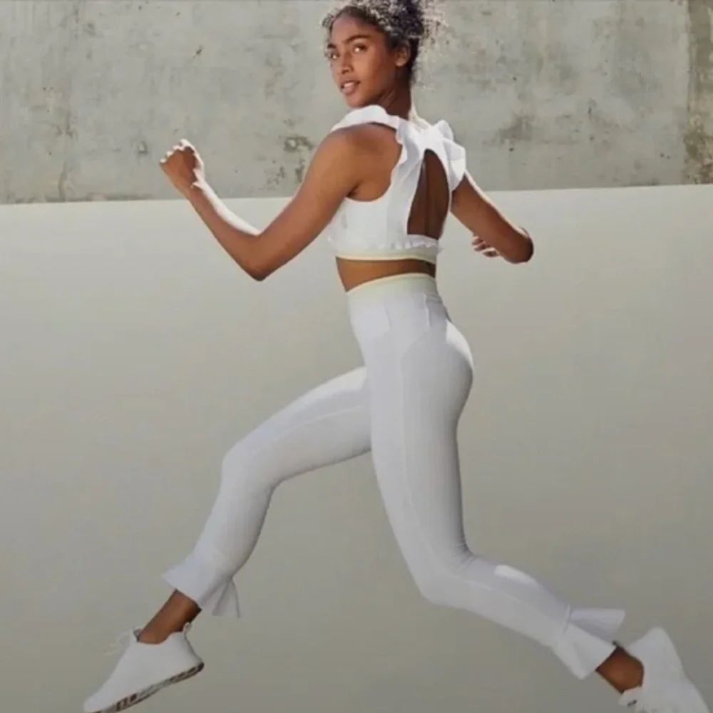 {Free People Movement} High Rise Legging Sanctuary Ruffle Cuff | Pale Blue - S